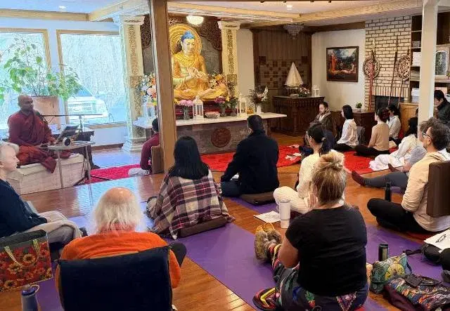 Buddhist monk leading a Dhamma talk at the retreat