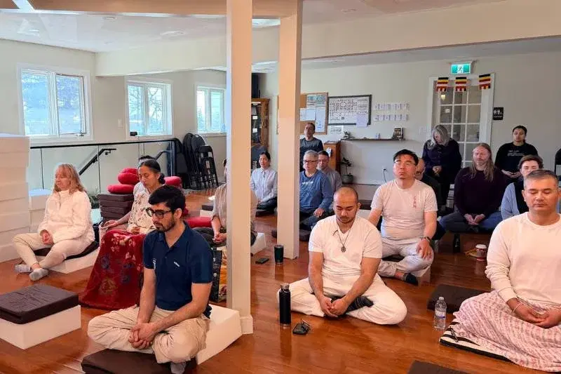 Retreat participants in focused sitting practice at the Mahamevnawa Buddha Meditation Centre day-long retreat in Winnipeg